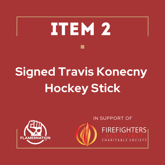 Item 2: Signed Travis Konecy stick